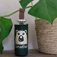 X-Coser la funda de la botella