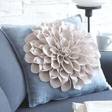 Coser flor de tela en forma de X