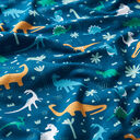 Tela de jersey de algodón Mundo de los dinosaurios | PETIT CITRON – petroleo, 